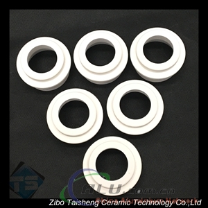 Aluminum titanate sprue bushing